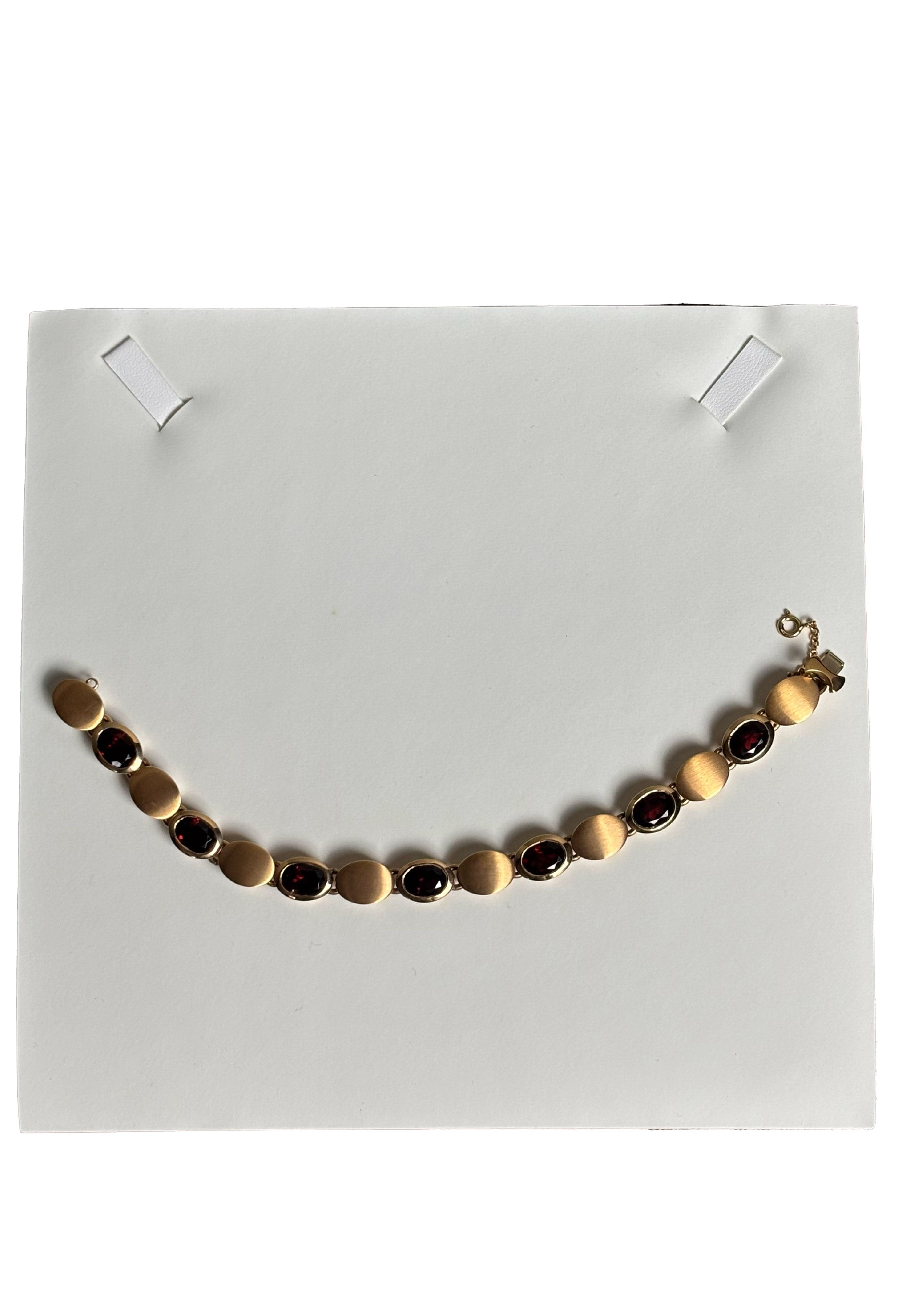 Bracciale oro rosa granati